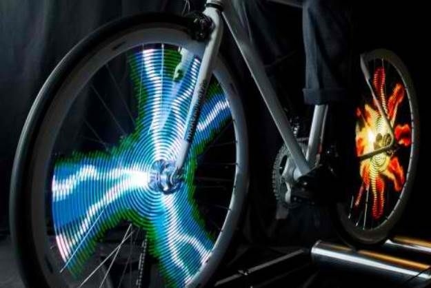 Bike Wheel Projects Cartoons While In Motion [Video] | Bike lights, Bike  safety, Bike wheel