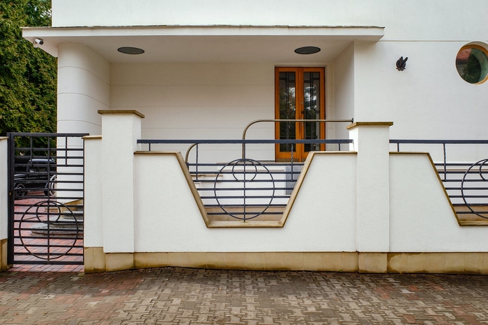 The original Functionalist fence and entrance portal.