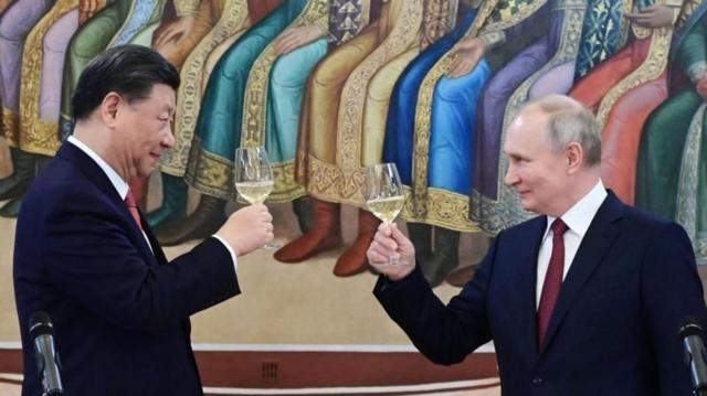 Підпис до фото,Сі зустрічався з Путіним понад 40 разів - вдвічі більше, ніж з будь-яким іншим світовим лідером