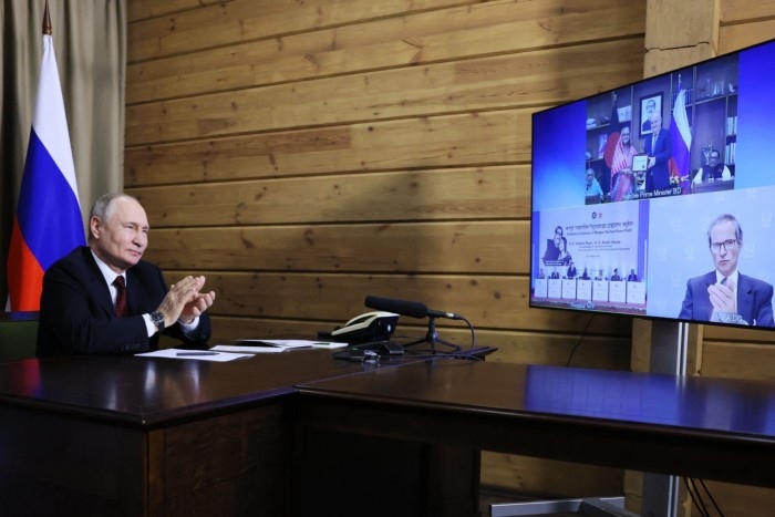 President Vladimir Putin attends a ceremony via video link to celebrate a uranium delivery for the Rooppur plant