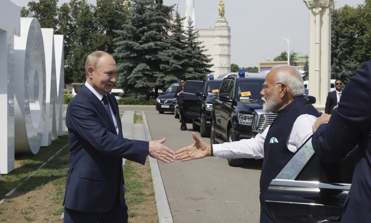 Russian President Vladimir Putin and Indian Prime Minister Narendra Modi tour the Atom Pavilion, a permanent exhibition center at the All-Russia Exhibition Centre in Moscow on July 9, 2024. Photo: VCG