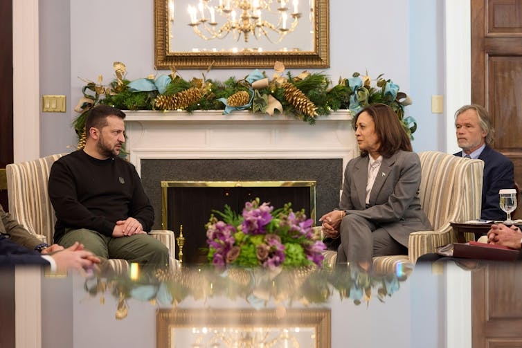 US vice-president Kamala Harris sitting talking with Ukrainian president Volodymyr Zelensky in December 2023