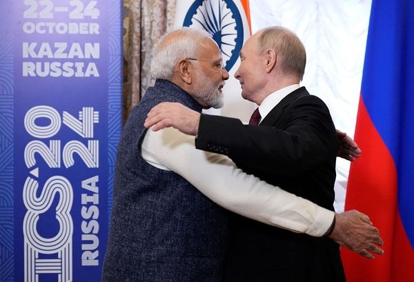 Russian President Vladimir Putin embraces Indian Prime Minister Narendra Modi during their meeting on the sidelines of the BRICS summit in Kazan, Russia, on 22 October 2024.  (Alexander Zemlianichenko/Pool via Reuters)