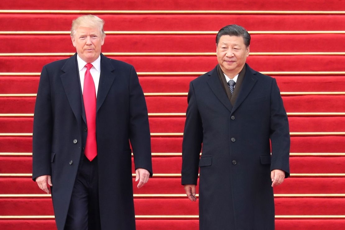 Chinese President Xi Jinping, right, holds a grand ceremony to welcome US President Donald Trump in Beijing, on November 9, 2017.
