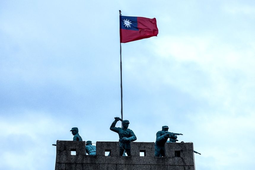 Statues of soldiers on the Bada Tower are seen in Kinmen, Taiwan, on October 28, 2025.