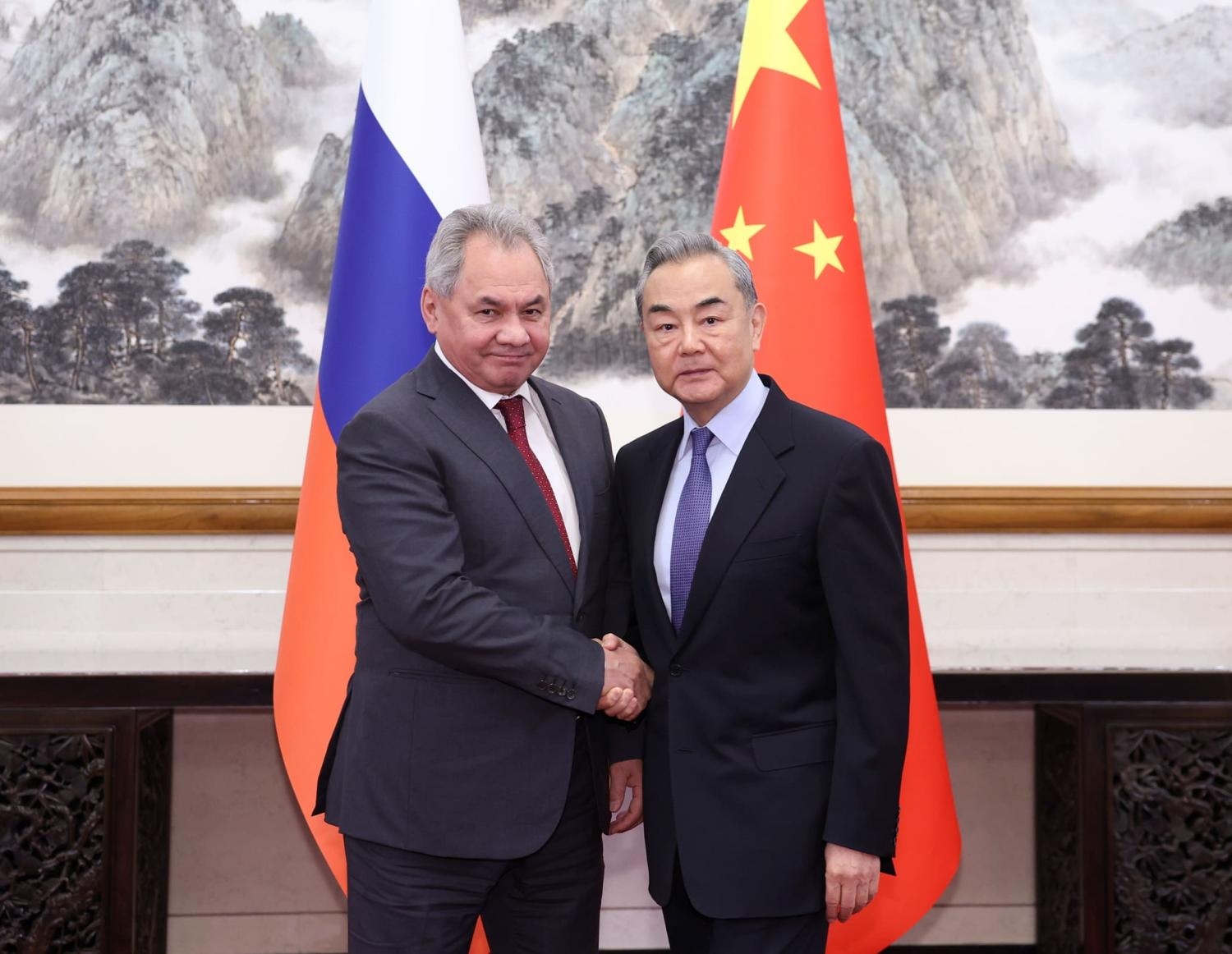 Russia’s Security Council Secretary Sergei Shoigu (L) meets with China’s Foreign Minister Wang Yi earlier this year (Ding Haitao/Xinhua via Getty Images)