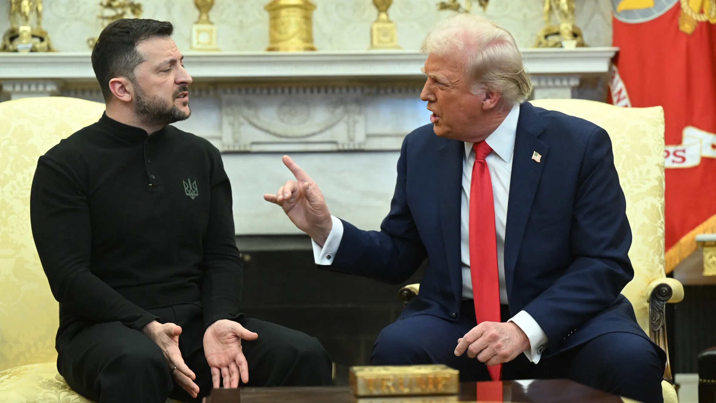 US President Donald Trump speaking with Ukraine's President Volodymyr Zelensky in the Oval Office.