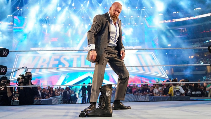 Triple H leaves his boots in the ring: photos | WWE