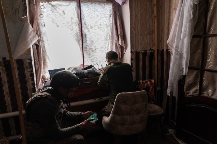 Members of the special Ukrainian army unit of drones operate reconnaissance positions of Russian forces using Starlink technology in Donbas in May