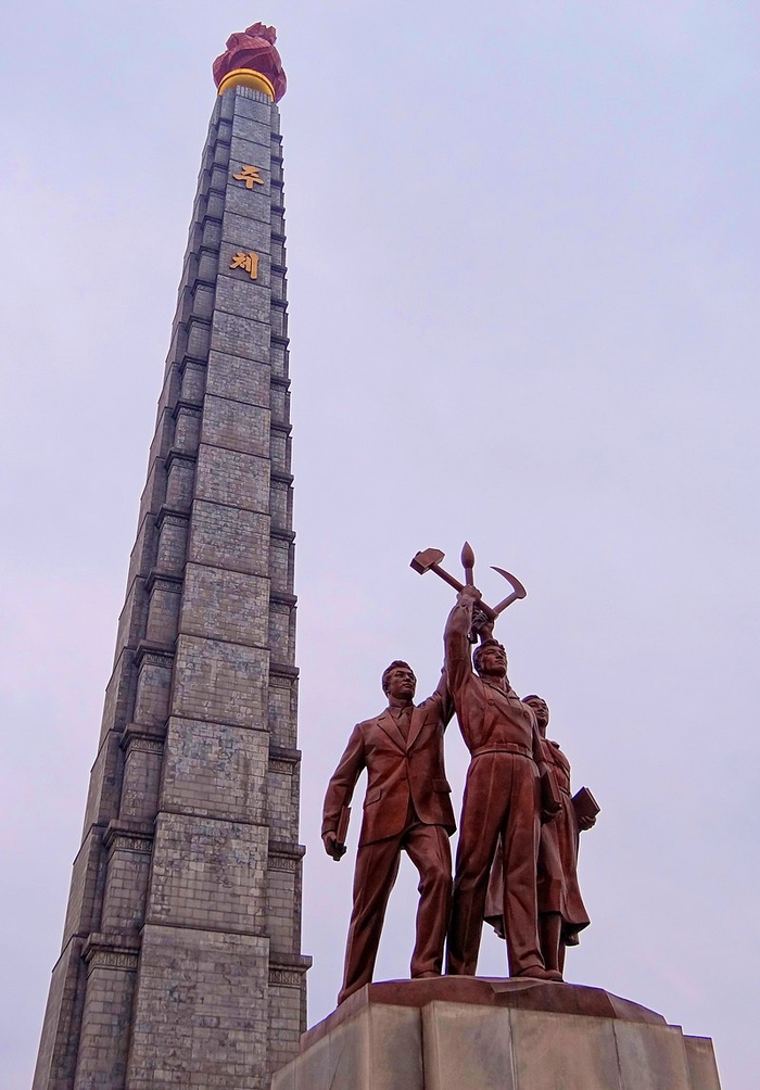 Up-close view of the Juche Tower and the accompanying monument to the Workers' Party of Korea