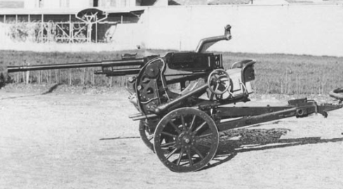 .Прототип Cannone-Mitragliera Breda da 20/65 Modello 1935  зверніть увагу на старі артилерійські колеса, не прийняті для серійних гармат.