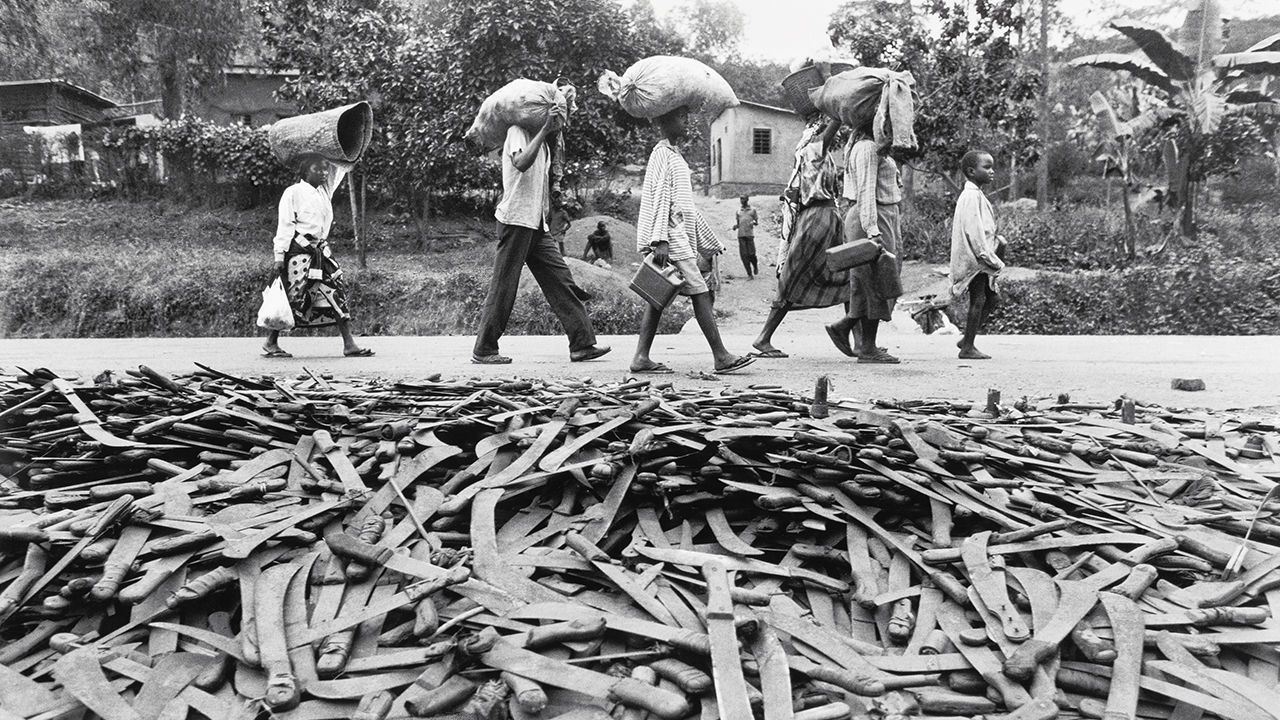 Thousands of abandoned machetes collect at the border of Rwanda and Tanzania, 1 January 1994