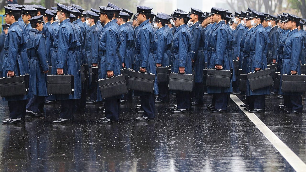 National Defense Academy of Japan cadets stand at attention prior to marching to class in Japan in 2014