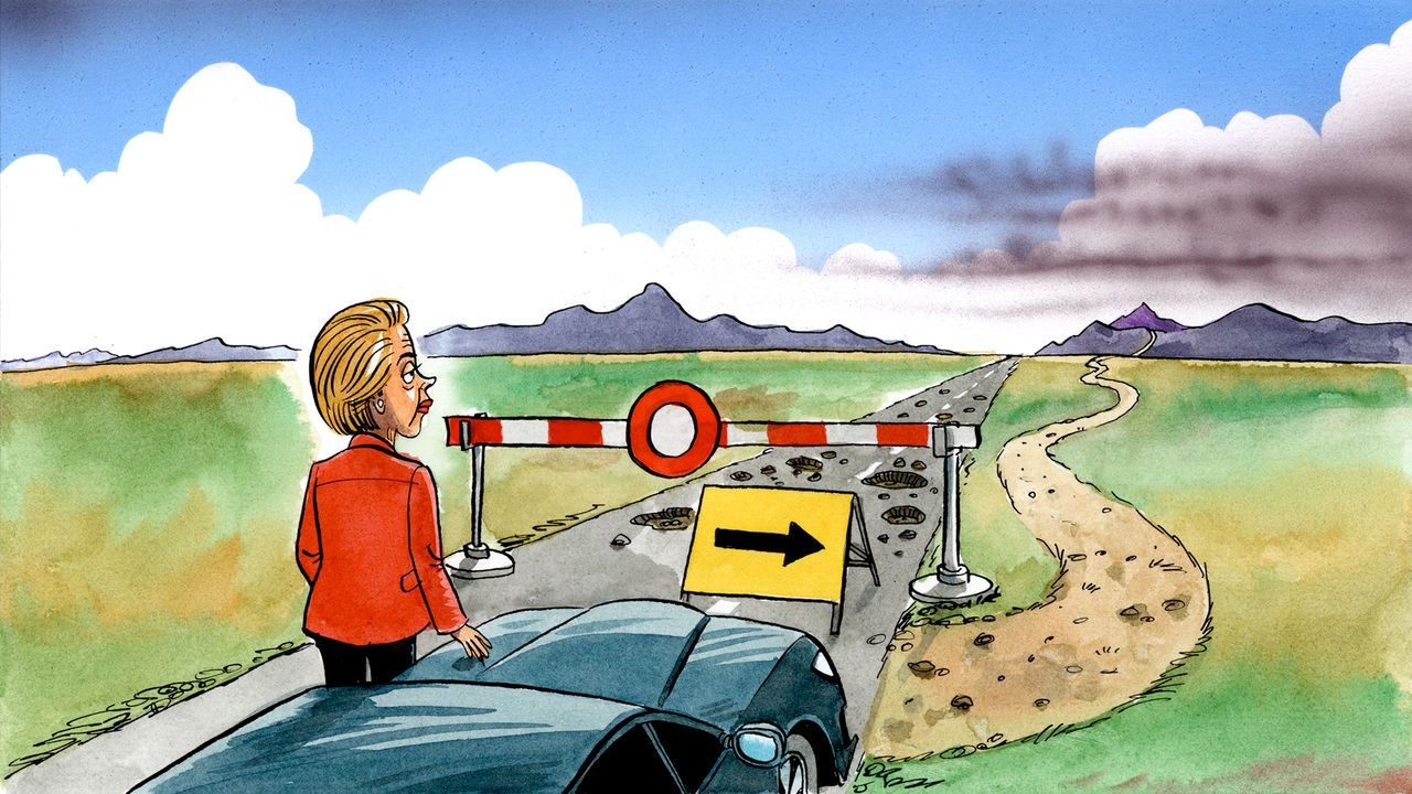 Ursula von der Leyen stands beside her car in front of a road block. An arrow points to a winding, potholed road