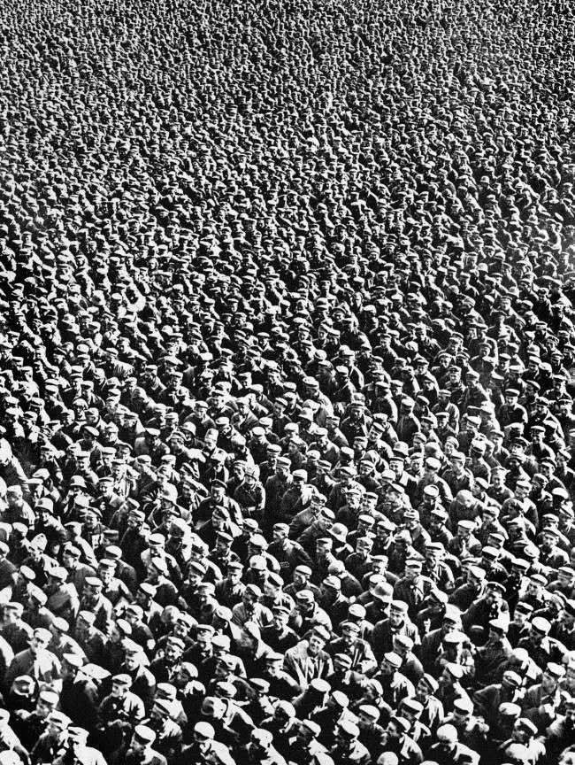 Massed German prisoners of war at a clearing station after the successful Allied offensive near Amiens in Northern France, which began on the 8th August 1918