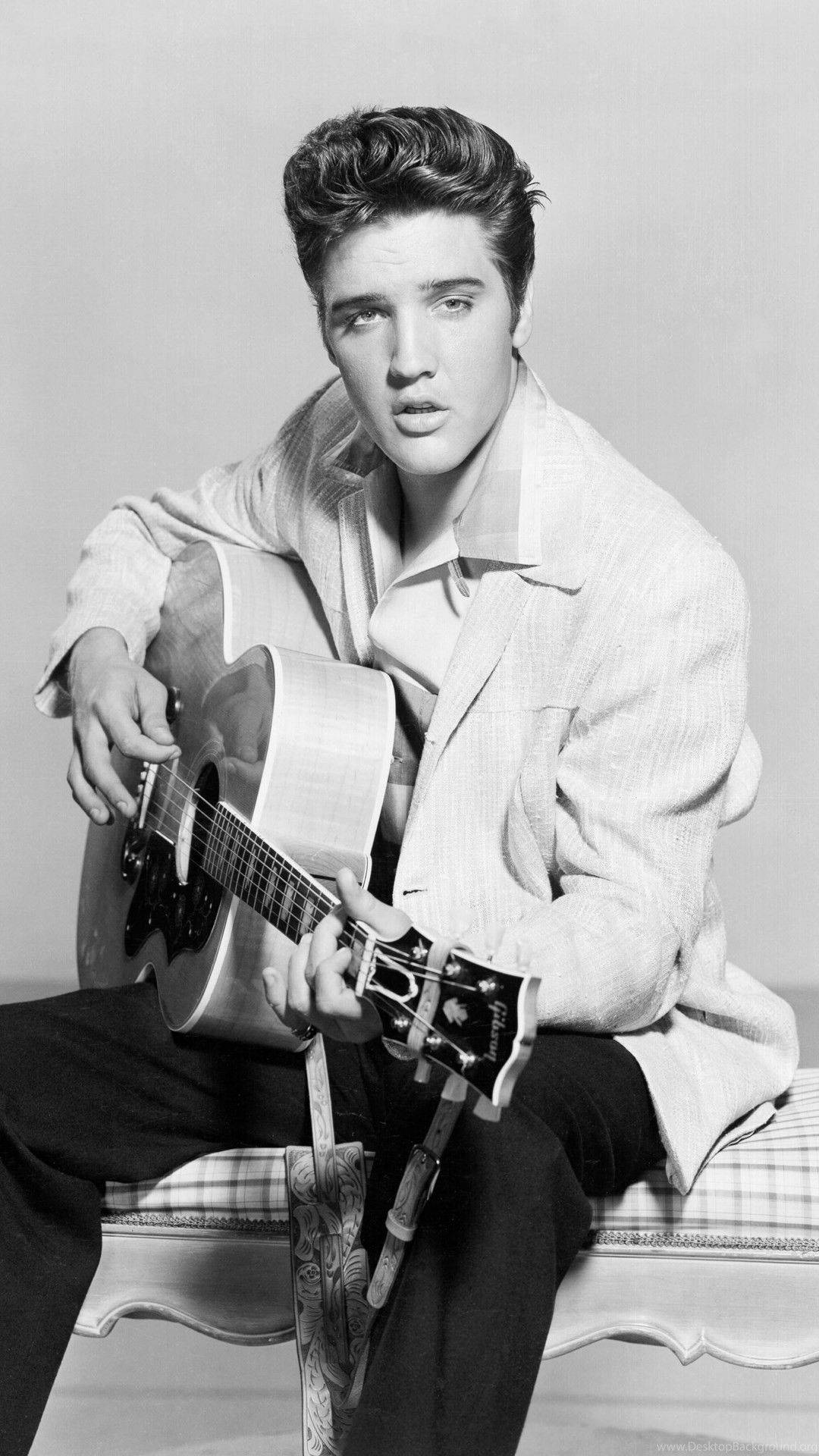 Download Elvis Presley Sitting Black And White Wallpaper | Wallpapers.com