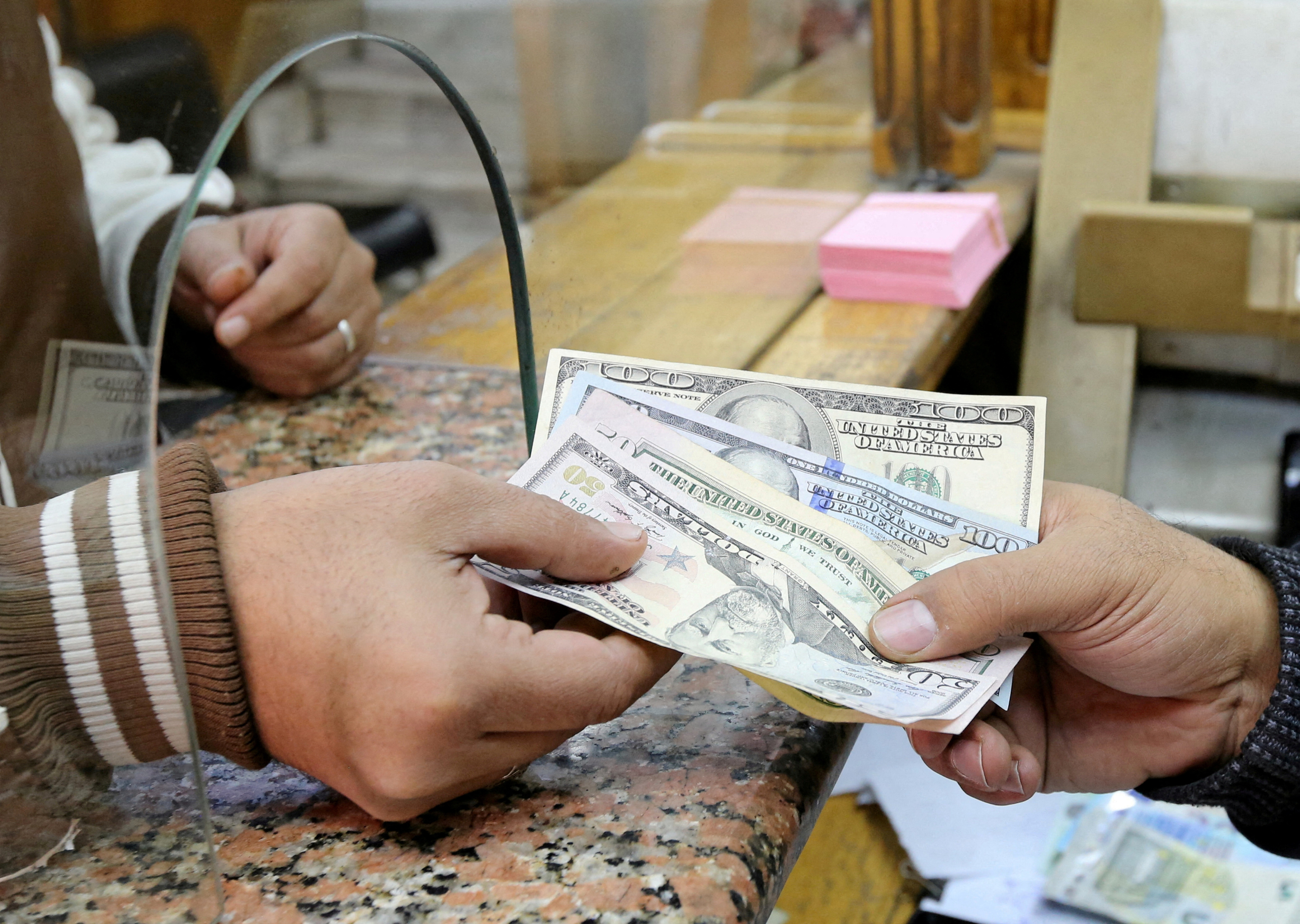 Egypt's pound sinks further against dollar after flexibility pledge |  Reuters