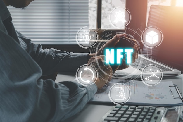 Businessman using a computer trading or investment nft non fungible token  for crypto art blockchain technology concept | Premium Photo