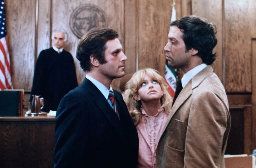 Головні актори: Голді Гоун, Чеві Чейз та Чарльз Гродін