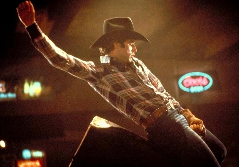 Міський ковбой (Urban Cowboy) - Джон Траволтана механічному бику