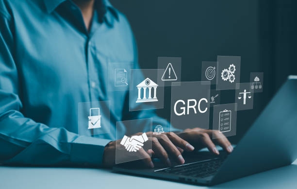 GRC Concept. Governance Risk and Compliance, Businessman with GRC governance, risk, compliance icons, organizational management, and regulatory practices. Reduce noncompliance risk, Business ethics, GRC Concept. Governance Risk and Compliance, Businessman with GRC governance, risk, compliance icons, organizational management, and regulatory practices. Reduce noncompliance risk, Business ethics, How to Prevent Duplicate Compliance Efforts With Integrated GRC Management stock pictures, royalty-free photos & images