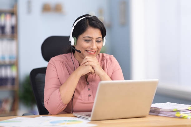 Woman wearing headset have meeting online, video conferencing stock photo Woman wearing headset have meeting online, video conferencing Customer Service Virtual Assistant stock pictures, royalty-free photos & images